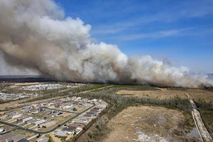 Fire forces evacuation of 100s of homes in Florida Panhandle