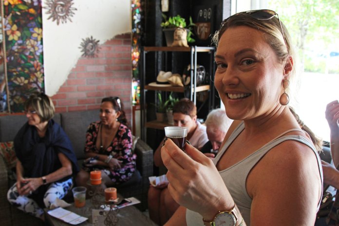 Kami Kreaps tasting Tinto coffee during the tour stop at Salento Coffee